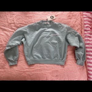 NWT Madhappy cropped crew neck. Size Small. Vintage turquoise blue